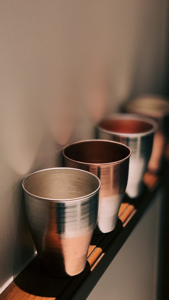 Handspun Copper glasses with silver vermeil technique applied with a gradient fade and matt to gloss finish